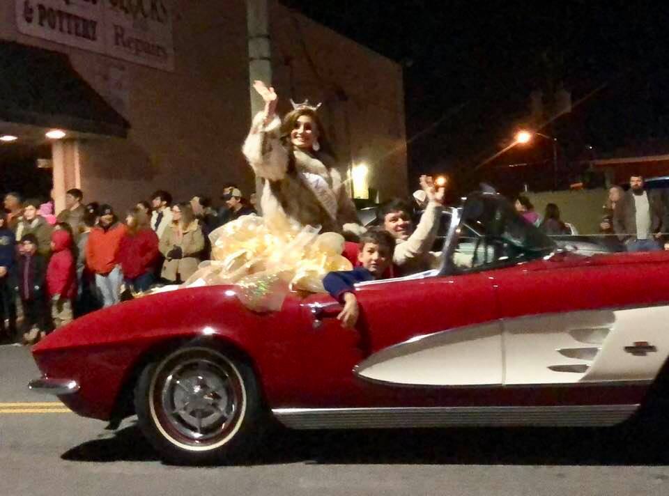 Miss North Carolina Laura Matrazzo rides in a vintage Corvette provided by Wayne Thomas Chevrolet in the 2018 Asheboro Christmas Parade. (The North State Journal)