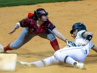 Hoke County softball makes a play to get the runner out at third base during the Bucks’ win over Pinecrest (David Sinclair/NSJ)