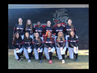 The Hoke County softball team poses for a team photo after a recent game. (Photo courtesy HCHS Bucks Softball Twitter/X account)