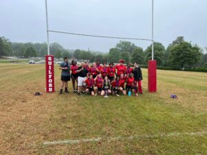 Hoke’s girls’ rugby team celebrates its state championship, putting an exclamation point on the team’s debut season. (Photos courtesy Hoke County Rugby Football Club)