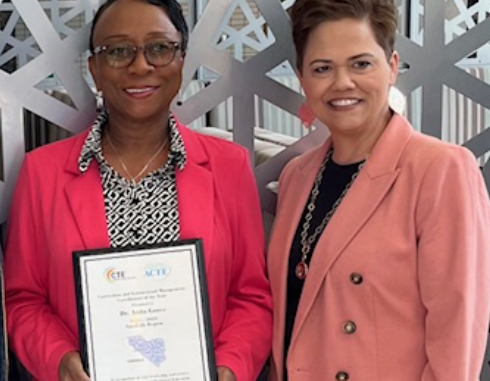 Dr. Anita Grove (left) stands with Dr. Dana Chavis (right) - from Hoke County Schools
