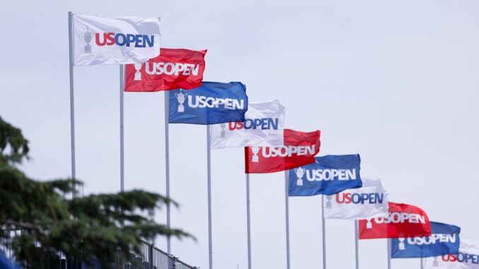 U.S. Open flags flap in the breeze during a practice round ahead of the 2024 U.S. Open. (Mike Ehrmann/USGA)