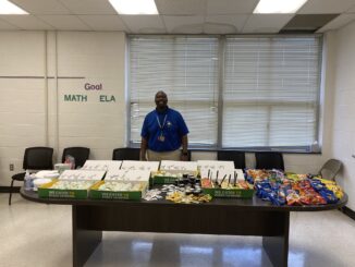 Antonio Covington poses before a Boss’s Day luncheon while serving as principal of East Hoke Middle School last year. Covington will take on a new role, as athletic director for Hoke County High School, on July 1. (Covington’s Twitter/X account)