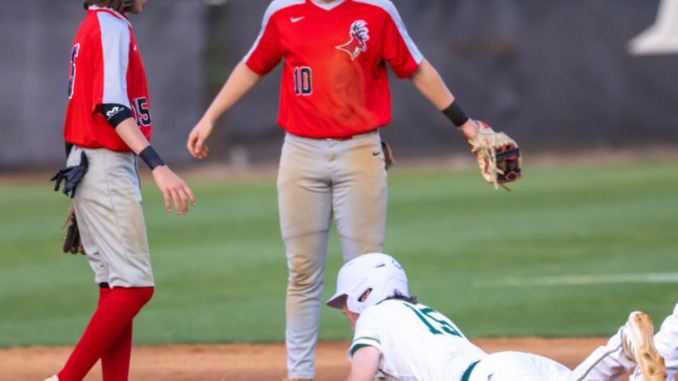 Hoke infielders wait for the call on a play during a 2023 game against Pinecrest. Baseball was the one high school sport that saw a decrease in participation in North Carolina this year. David Sinclair for North State Journal)