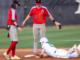 Hoke infielders wait for the call on a play during a 2023 game against Pinecrest. Baseball was the one high school sport that saw a decrease in participation in North Carolina this year. David Sinclair for North State Journal)