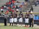 Hoke County’s captains for the opening game, (L to R) Tafari Parker, Josh Ferrell, Franajai Ransom, Brandon Saunders, get ready for the coin toss. (Hal Nunn for the North State Journal)