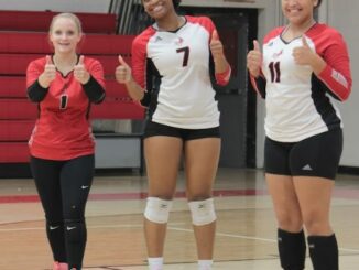 It’s been all thumbs up this season for (L to R) Aubrey Carpenter, Abigail Watts and Chayna Locklear and the rest of Hoke County’s volleyball team.